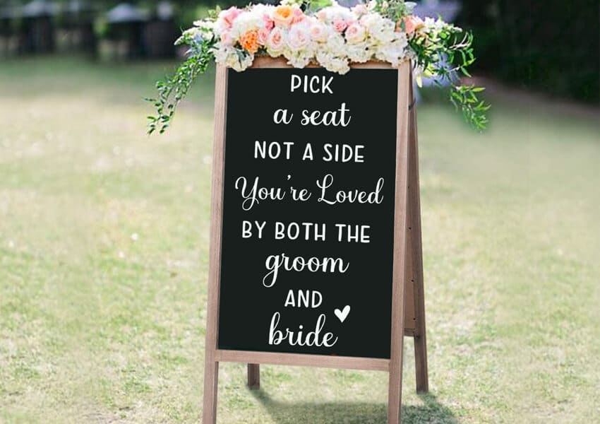 Pick A Seat Not A Side You're Loved by Groom And Bride Wooden Sign