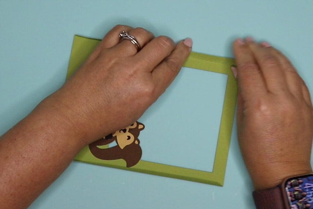 Fold forward on score lines for all interior shadow box layers.