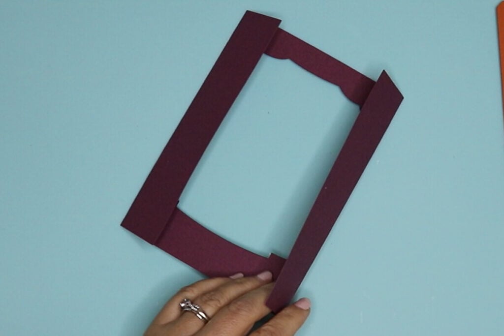 Fold the score lines in the opposite direction for the front card layer.