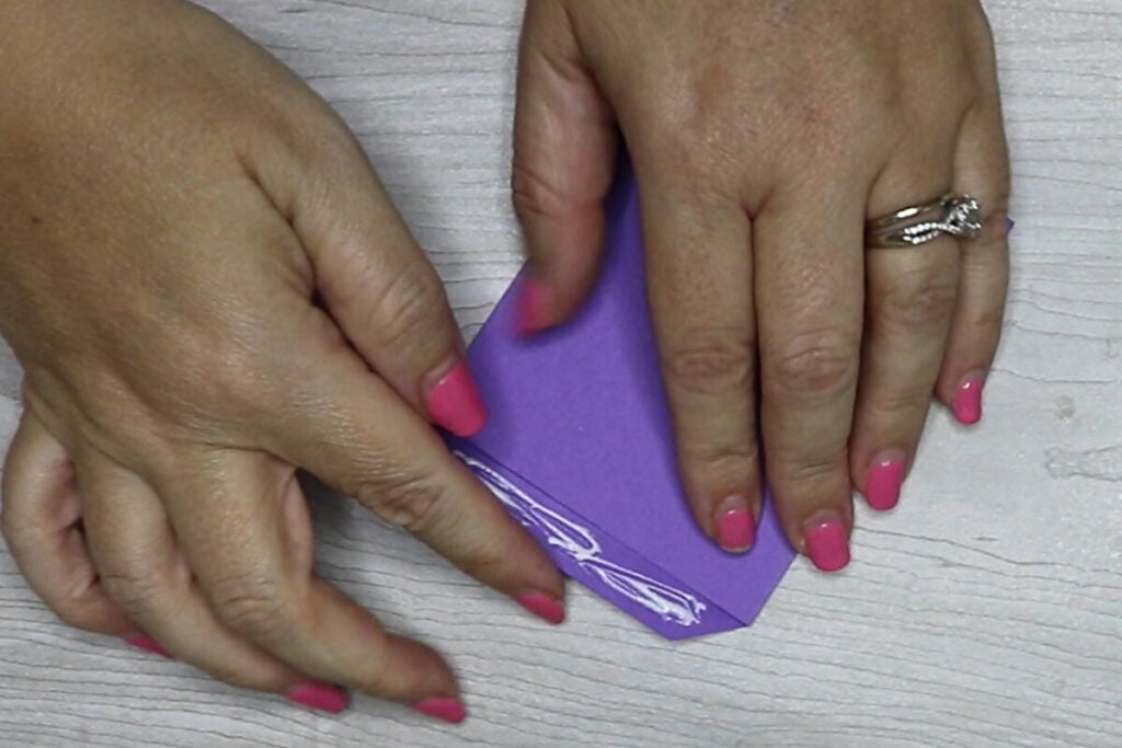 Glue the bottom tab piece to the outside