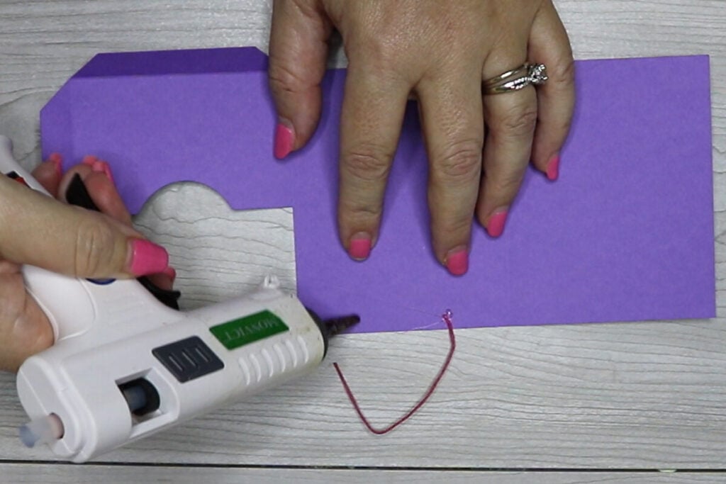 Use hot glue to glue the handle on