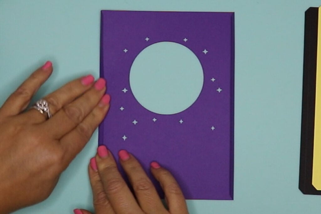 fold each card layer up on the score lines