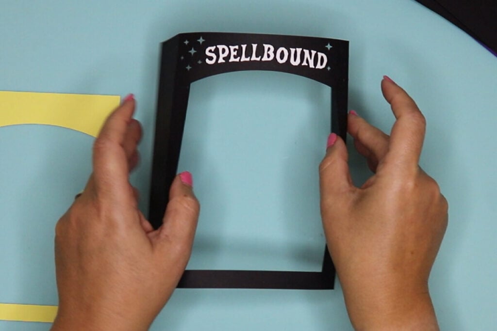 fold the front card layer back on the score lines